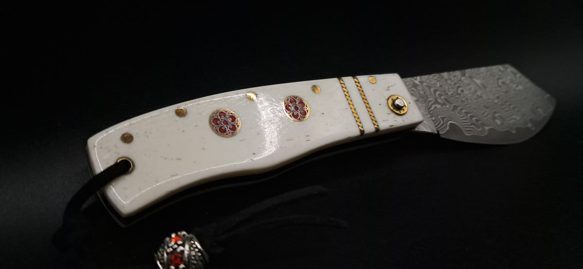 COLTELLO ARTIGIANALE SCUOIETTO