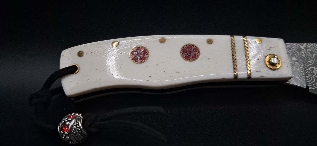COLTELLO ARTIGIANALE SCUOIETTO