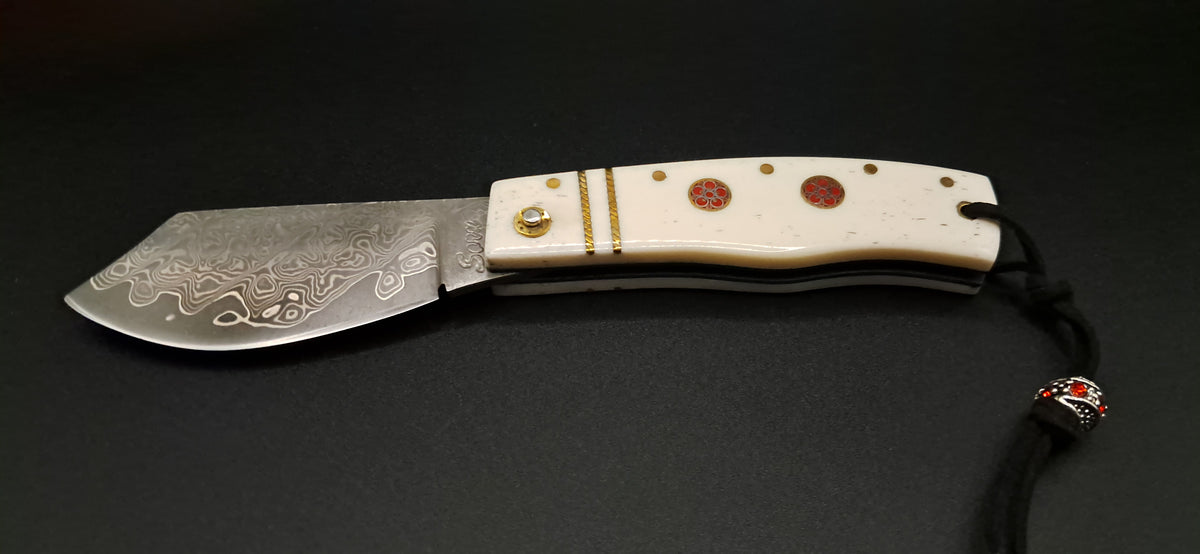 COLTELLO ARTIGIANALE SCUOIETTO