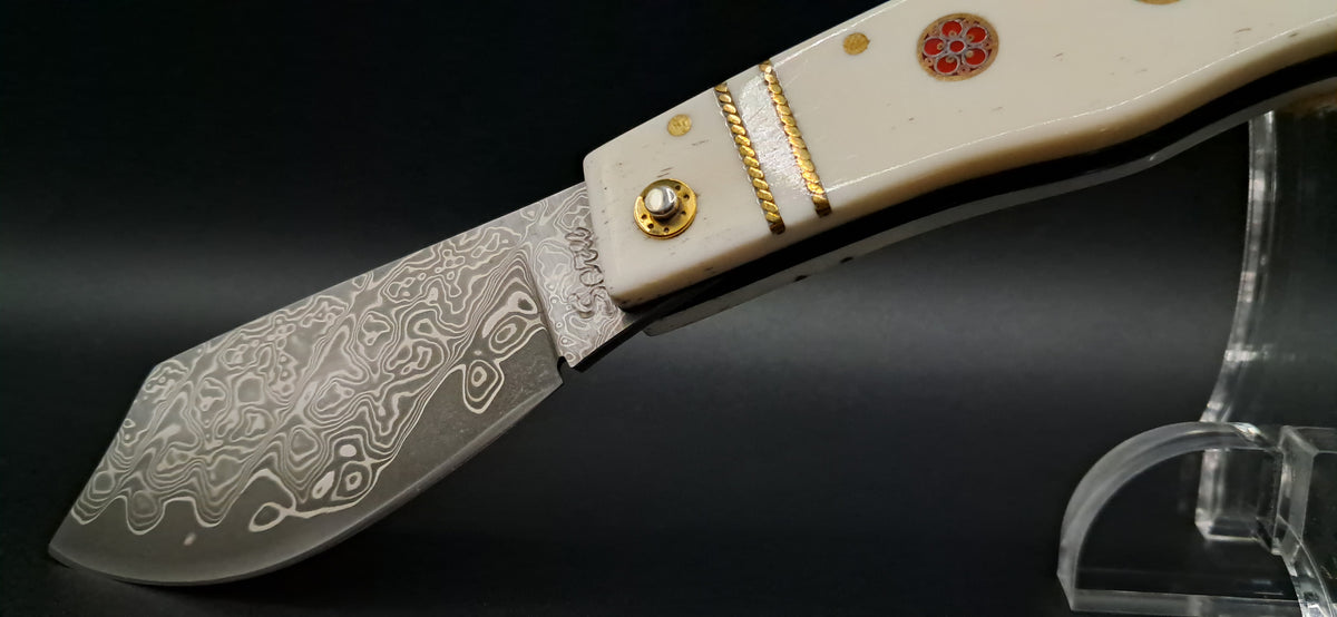 COLTELLO ARTIGIANALE SCUOIETTO