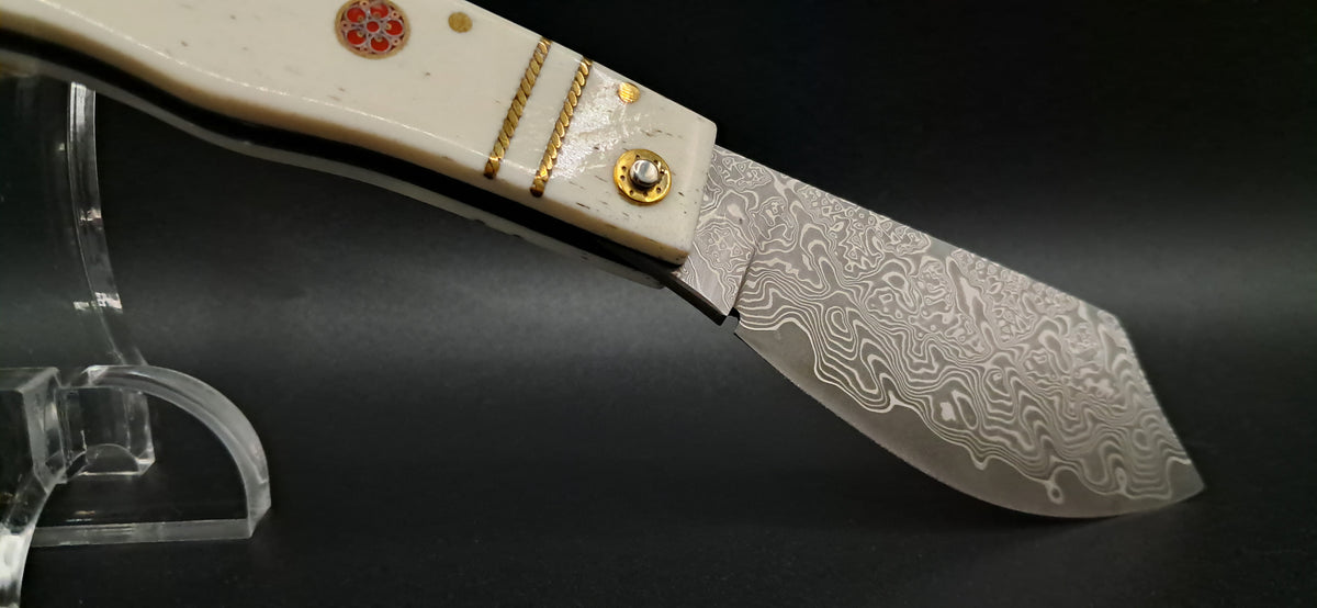 COLTELLO ARTIGIANALE SCUOIETTO