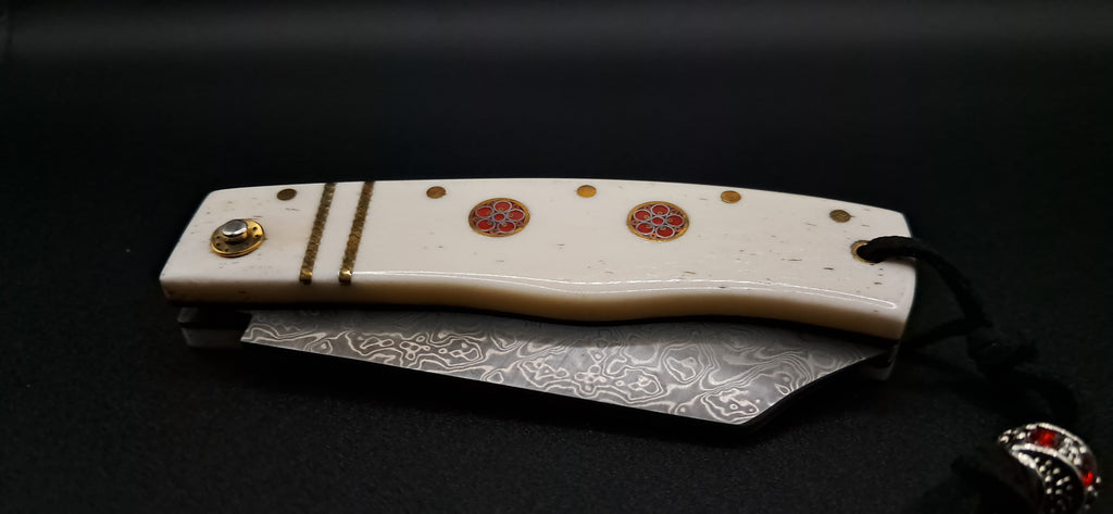 COLTELLO ARTIGIANALE SCUOIETTO