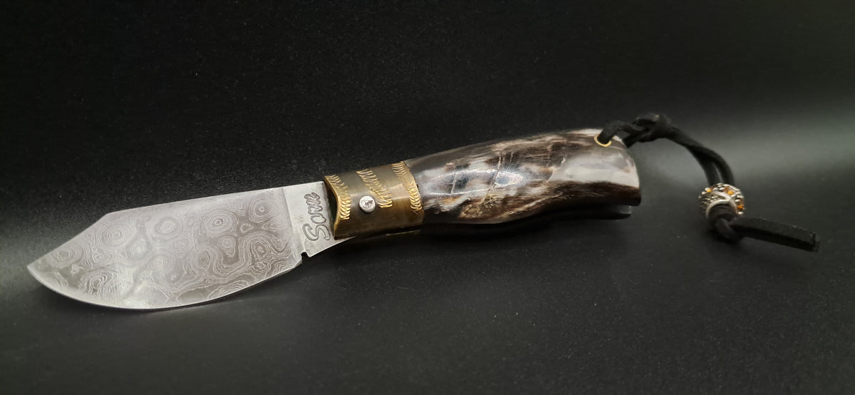 COLTELLO ARTIGIANALE SCUOIETTO