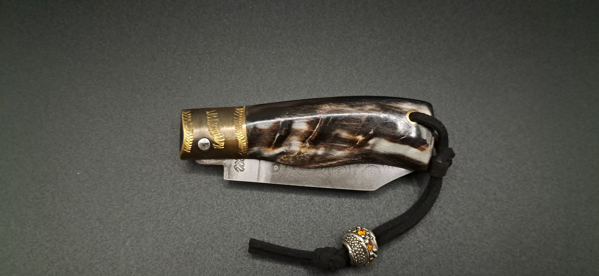 COLTELLO ARTIGIANALE SCUOIETTO